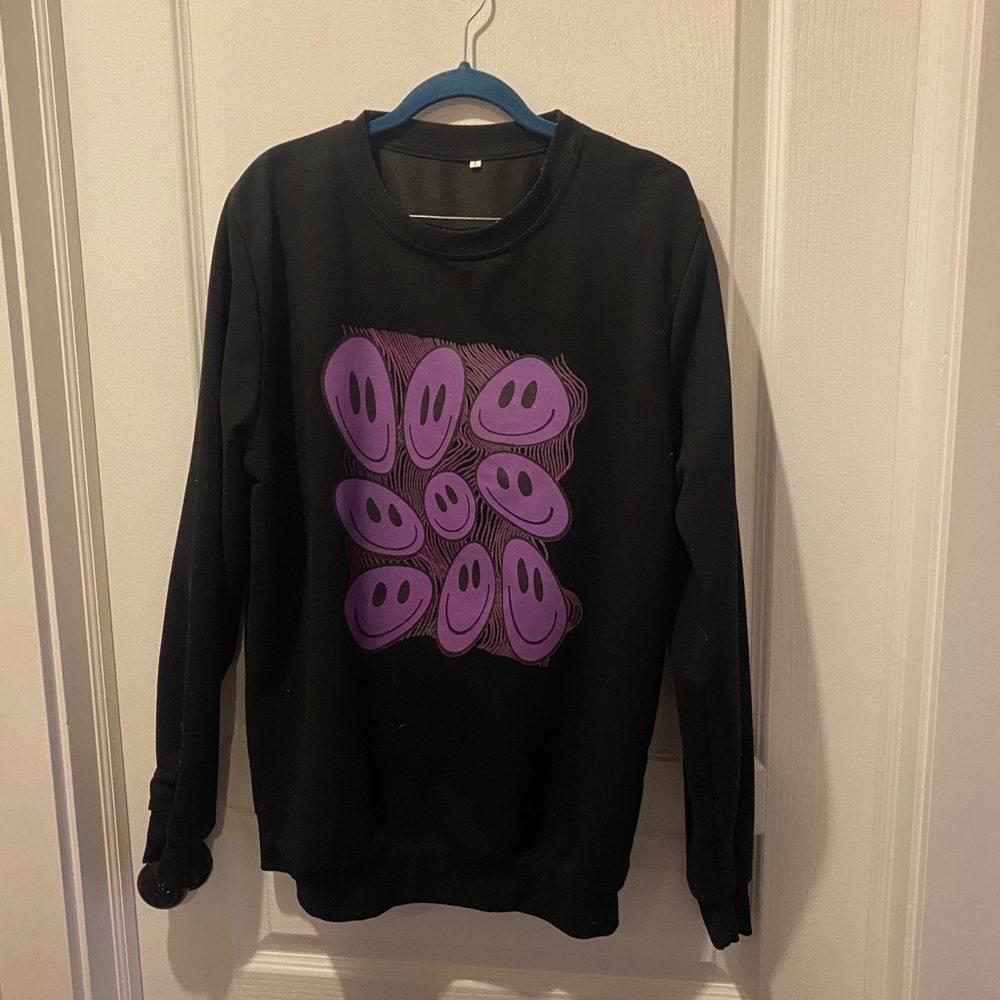 Black sweatshirt with purple smiley faces